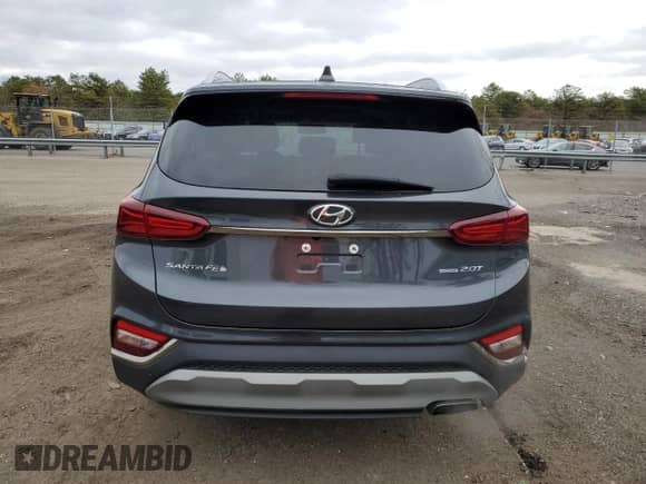 2020 Hyundai Santa Fe Limited z VIN 5NMS5CAA7LH298988, wystawiony jako Copart lot #71509862 z przebiegiem 25 372 mil mil oraz . Historia ofert i sprzedaży dostępna na DreamBid. Obrazek 6.