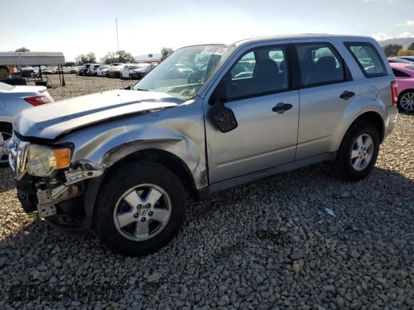 ✅ 2009 Ford Escape XLS • VIN: 1FMCU02749KB40030 • Lot: 91809815. Listed on Copart with 161,697 mi. Free auction sales archive from the USA and detailed vehicle history report at DreamBid. Image 1.