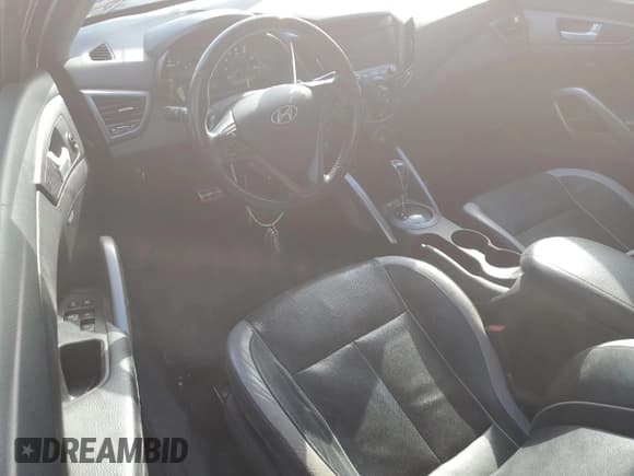 ✅ 2014 Hyundai Veloster Turbo • VIN: KMHTC6AE1EU201726 • Lot: 77917514. Wystawiony na Copart z przebiegiem 93 402 mil. Bezpłatny archiwum sprzedaży aukcyjnych z USA i szczegółowy raport historii pojazdu na DreamBid. Zdjęcie 8.