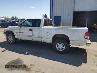 ✅ 1999 Dodge Dakota SLT • VIN: 1B7GG22X5XS125249 • Lot: 51854885. Wystawiony na Copart z przebiegiem 169 018 mil. Bezpłatny archiwum sprzedaży aukcyjnych z USA i szczegółowy raport historii pojazdu na DreamBid. Zdjęcie 2.