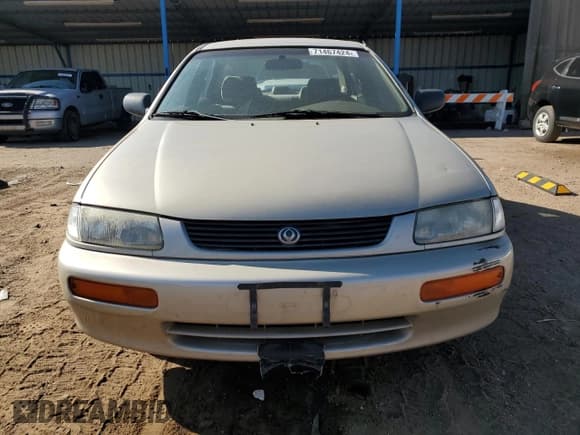 ✅ 1996 Mazda Protege • VIN: JM1BB1426T0328645 • Lot: 89289635. Listed on Copart with 127,311 mi. Free auction sales archive from the USA and detailed vehicle history report at DreamBid. Image 5.