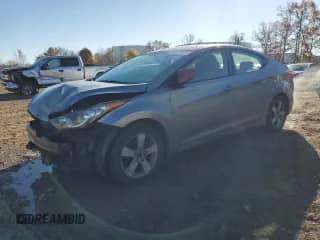 2012 Hyundai Elantra GLS with VIN KMHDH4AE5CU305899, listed as a Copart auction lot 90031115 with 166,652 mi miles and Salvage title. Bid and sale history available at DreamBid. Image 1.