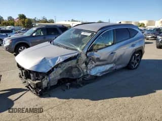 2022 Hyundai Tucson SEL with VIN KM8JBDA26NU050516, listed as a Copart auction lot 76061034 with 42,340 mi miles and Salvage title. Bid and sale history available at DreamBid. Image 1.