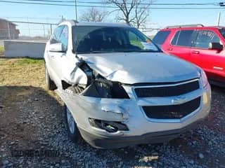 2011 Chevrolet Traverse 1LT z VIN 1GNKRGED1BJ255070, wystawiony jako IAAI lot #41209020 z przebiegiem Nie podano mil oraz . Historia ofert i sprzedaży dostępna na DreamBid. Obrazek 1.