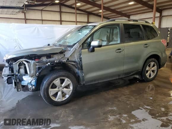 2015 Subaru Forester Premium with VIN JF2SJADC1FG527174, listed as a Copart auction lot 63312005 with 76,204 mi miles and Salvage title. Bid and sale history available at DreamBid. Image 1.