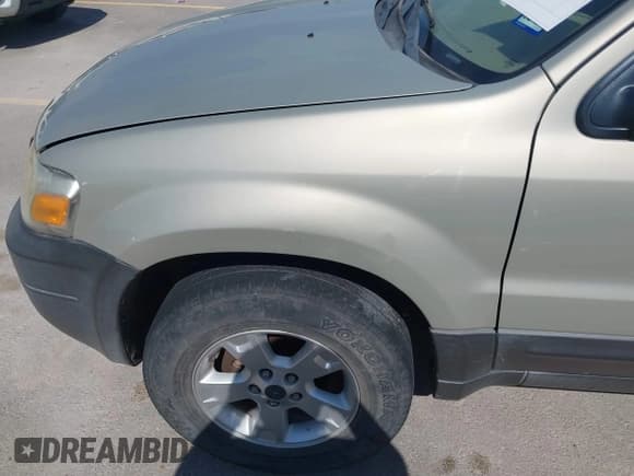 ✅ 2005 Ford Escape XLT • VIN: 1FMCU03165DA08296 • Лот: 41677892. Опубликован ранее на IAAI с пробегом 255 431 миль. Бесплатный доступ к архиву аукционных продаж из США и подробный отчёт об истории автомобиля на DreamBid. Изображение 6.