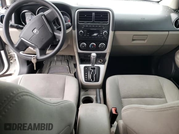 ✅ 2012 Dodge Caliber SXT • VIN: 1C3CDWDA4CD535275 • Лот: 73158062. Опубликован ранее на Copart с пробегом 126 940 миль. Бесплатный доступ к архиву аукционных продаж из США и подробный отчёт об истории автомобиля на DreamBid. Изображение 8.