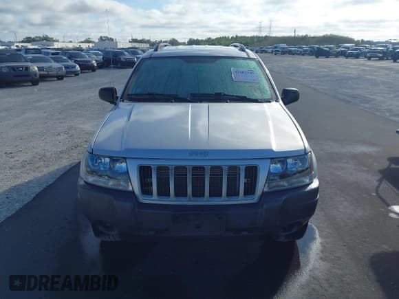✅ 2004 Jeep Grand Cherokee Laredo • VIN: 1J4GX48SX4C360639 • Lot: 43402545. Listed on IAAI with 217,717 mi. Free auction sales archive from the USA and detailed vehicle history report at DreamBid. Image 6.