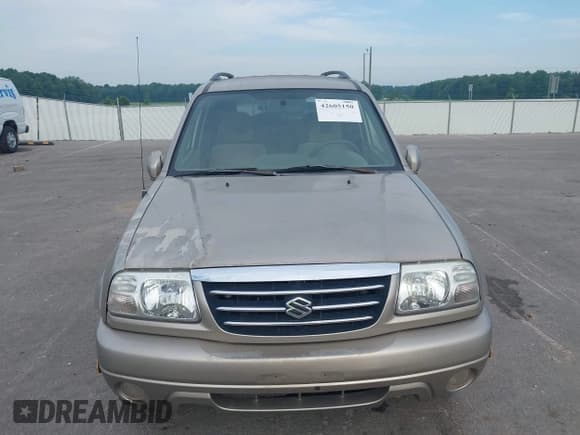 ✅ 2003 Suzuki XL7 Touring • VIN: JS3TX92V934105365 • Lot: 42605150. Wystawiony na IAAI z przebiegiem 274 568 mil. Bezpłatny archiwum sprzedaży aukcyjnych z USA i szczegółowy raport historii pojazdu na DreamBid. Zdjęcie 6.