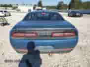 2021 Dodge Challenger R/T with VIN 2C3CDZBT4MH571347, listed as a Copart auction lot 86241135 with 76,060 mi miles and Salvage title. Bid and sale history available at DreamBid. Image 6.