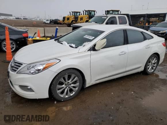 2013 Hyundai Azera z VIN KMHFG4JG0DA224230, wystawiony jako Copart lot #53915475 z przebiegiem 143 788 mil mil oraz Czysty tytuł • Clean title. Historia ofert i sprzedaży dostępna na DreamBid. Obrazek 1.
