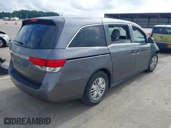 ✅ 2015 Honda Odyssey LX • VIN: 5FNRL5H26FB032334 • Lot: 42722152. Listed on IAAI with 117,539 mi. Free auction sales archive from the USA and detailed vehicle history report at DreamBid. Image 4.
