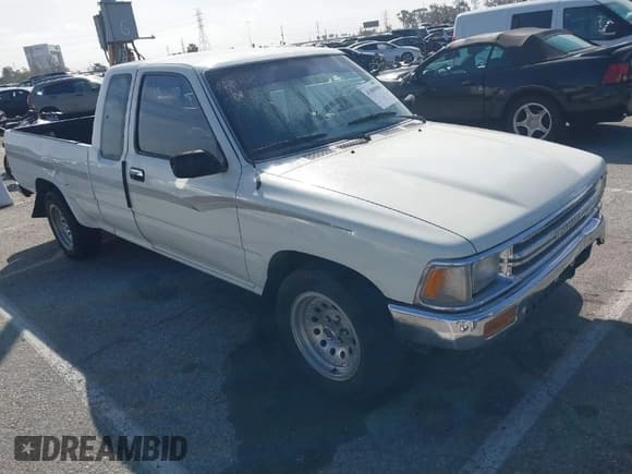 ✅ 1991 Toyota Pickup • VIN: JT4VN93D9M5018869 • Lot: 41809090. Listed on IAAI with 312,527 mi. Free auction sales archive from the USA and detailed vehicle history report at DreamBid. Image 1.