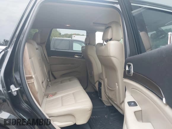 ✅ 2015 Jeep Grand Cherokee Limited • VIN: 1C4RJFBG9FC830985 • Lot: 43278241. Listed on IAAI with 154,948 mi. Free auction sales archive from the USA and detailed vehicle history report at DreamBid. Image 8.