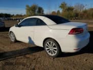 ✅ 2014 Volkswagen Eos Komfort • VIN: WVWBW8AH2EV000733 • Лот: 82770925. Опубликован ранее на Copart с пробегом 139 754 миль. Бесплатный доступ к архиву аукционных продаж из США и подробный отчёт об истории автомобиля на DreamBid. Изображение 2.