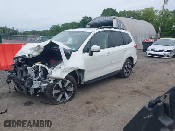 2018 Subaru Forester Limited with VIN JF2SJARC5JH618041, listed as a IAAI auction lot 42335823 with 17,507 mi miles and . Bid and sale history available at DreamBid. Image 2.