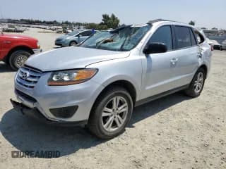 ✅ 2010 Hyundai Santa Fe GLS • VIN: 5NMSGDAB0AH416000 • Lot: 64804024. Listed on Copart with 172,471 mi. Free auction sales archive from the USA and detailed vehicle history report at DreamBid. Image 1.