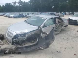 2013 Chevrolet Malibu LTZ z VIN 1G11H5SA6DF146284, wystawiony jako Copart lot #80020345 z przebiegiem 126 882 mil mil oraz Szkoda całkowita • Salvage title. Historia ofert i sprzedaży dostępna na DreamBid. Obrazek 1.