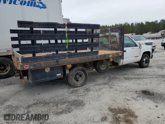 ✅ 1999 GMC Sierra 1500 • VIN: 1GDJC34R3XF087014 • Lot: 86367084. Wystawiony na Copart z przebiegiem 94 539 mil. Bezpłatny archiwum sprzedaży aukcyjnych z USA i szczegółowy raport historii pojazdu na DreamBid. Zdjęcie 3.
