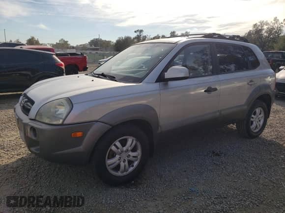 2006 Hyundai Tucson GLS z VIN KM8JN12D46U349221, wystawiony jako Copart lot #83877214 z przebiegiem 96 268 mil mil oraz Szkoda całkowita • Salvage title. Historia ofert i sprzedaży dostępna na DreamBid. Obrazek 1.
