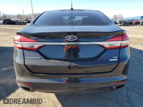 ✅ 2017 Ford Fusion SE • VIN: 3FA6P0H99HR204550 • Лот: 93405975. Опубликован ранее на Copart с пробегом 77 308 миль. Бесплатный доступ к архиву аукционных продаж из США и подробный отчёт об истории автомобиля на DreamBid. Изображение 6.