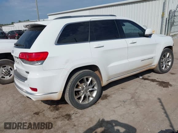 ✅ 2015 Jeep Grand Cherokee Summit • VIN: 1C4RJEJG5FC105296 • Lot: 43231201. Listed on IAAI with 124,311 mi. Free auction sales archive from the USA and detailed vehicle history report at DreamBid. Image 4.