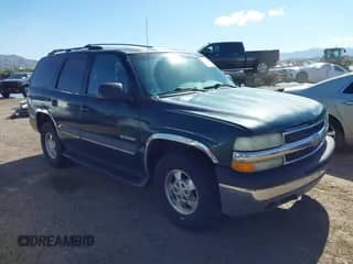 2002 Chevrolet Tahoe LS z VIN 1GNEC13V62R298540, wystawiony jako IAAI lot #43460753 z przebiegiem 301 459 mil mil oraz . Historia ofert i sprzedaży dostępna na DreamBid. Obrazek 1.