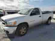 2006 Dodge 1500 SLT with VIN 1D7HA16N16J167310, listed as a Copart auction lot 90030015 with 162,169 mi miles and Salvage title. Bid and sale history available at DreamBid. Image 1.