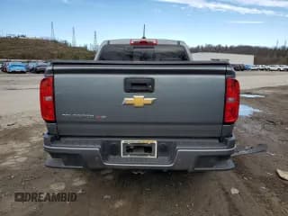 ✅ 2019 Chevrolet Colorado 4WD Z71 • VIN: 1GCGTDEN1K1289582 • Лот: 75827043. Опубликован ранее на Copart с пробегом 75 248 миль. Бесплатный доступ к архиву аукционных продаж из США и подробный отчёт об истории автомобиля на DreamBid. Изображение 6.