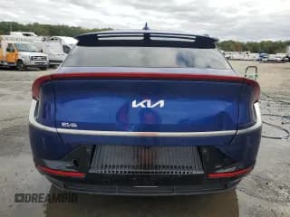 ✅ 2023 Kia EV6 Wind • VIN: KNDC34LA3P5612125 • Lot: 86242075. Wystawiony na Copart z przebiegiem 29 352 mil. Bezpłatny archiwum sprzedaży aukcyjnych z USA i szczegółowy raport historii pojazdu na DreamBid. Zdjęcie 6.