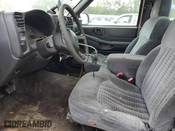 2003 Chevrolet S-10 with VIN 1GCCS14X238222095, listed as a Copart auction lot 82201395 with 128,728 mi miles and Salvage title. Bid and sale history available at DreamBid. Image 7.