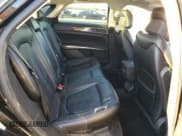 ✅ 2015 Lincoln MKZ • VIN: 3LN6L2JK2FR617403 • Lot: 90760715. Wystawiony na Copart z przebiegiem 128 703 mil. Bezpłatny archiwum sprzedaży aukcyjnych z USA i szczegółowy raport historii pojazdu na DreamBid. Zdjęcie 10.