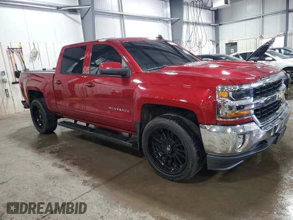 ✅ 2018 Chevrolet Silverado 1500 LT • VIN: 3GCUKREC6JG616656 • Lot: 63076885. Listed on Copart with 70,710 mi. Free auction sales archive from the USA and detailed vehicle history report at DreamBid. Image 4.
