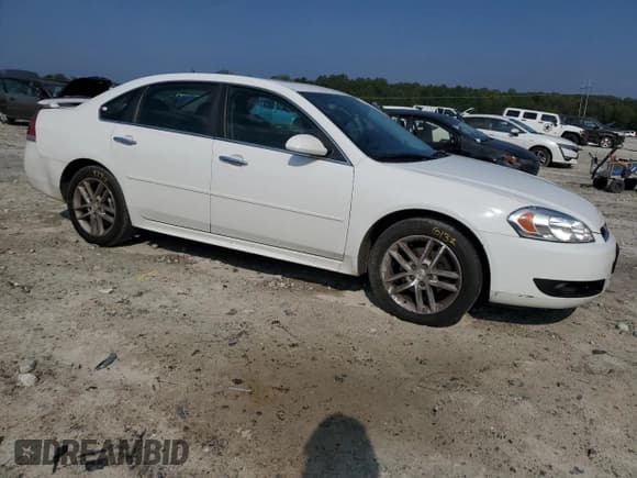 ✅ 2014 Chevrolet Impala LTZ • VIN: 2G1WC5E36E1151835 • Lot: 81037395. Listed on Copart with 149,301 mi. Free auction sales archive from the USA and detailed vehicle history report at DreamBid. Image 4.