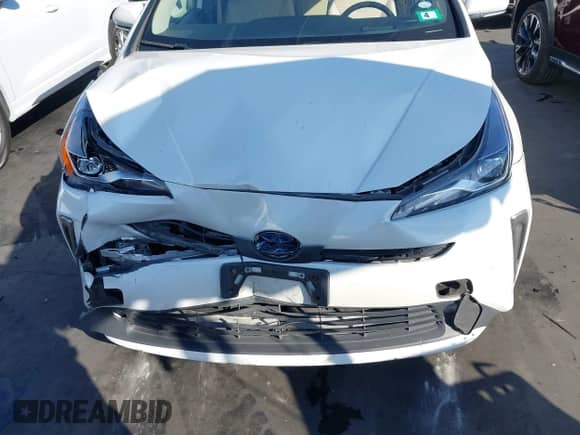 2020 Toyota Prius LE with VIN JTDL9RFU7L3015647, listed as a IAAI auction lot 43500977 with 55,174 mi miles and . Bid and sale history available at DreamBid. Image 13.