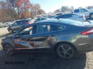 ✅ 2016 Ford Fusion Titanium • VIN: 3FA6P0K96GR140023 • Lot: 43714831. Listed on IAAI with 144,663 mi. Free auction sales archive from the USA and detailed vehicle history report at DreamBid. Image 14.