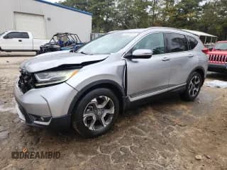 ✅ 2017 Honda CR-V Touring • VIN: 7FARW1H94HE033292 • Лот: 90445315. Опубликован ранее на Copart с пробегом 211 583 миль. Бесплатный доступ к архиву аукционных продаж из США и подробный отчёт об истории автомобиля на DreamBid. Изображение 1.