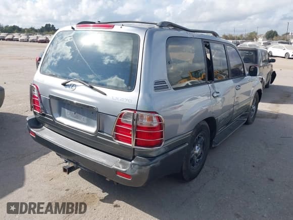 ✅ 2001 Lexus LX 470 • VIN: JTJHT00W813503335 • Lot: 43764556. Listed on IAAI with Not provided. Free auction sales archive from the USA and detailed vehicle history report at DreamBid. Image 4.