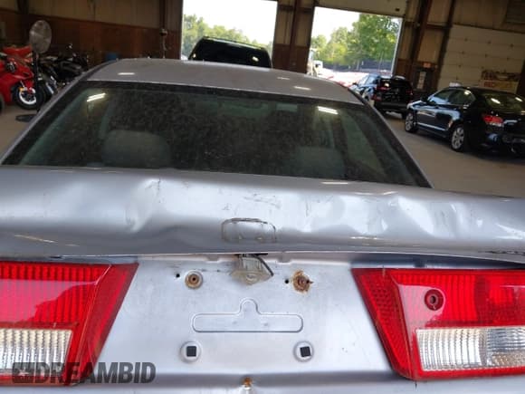 ✅ 2004 Honda Accord DX • VIN: 1HGCM55184A138824 • Lot: 43011734. Listed on IAAI with 216,840 mi. Free auction sales archive from the USA and detailed vehicle history report at DreamBid. Image 13.