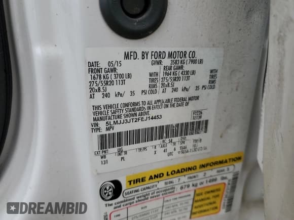 ✅ 2015 Lincoln Navigator • VIN: 5LMJJ3JT2FEJ14453 • Lot: 58723115. Listed on Copart with 154,651 mi. Free auction sales archive from the USA and detailed vehicle history report at DreamBid. Image 13.