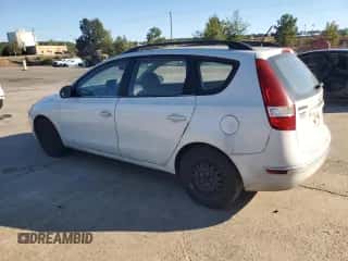 2010 Hyundai Elantra GLS with VIN KMHDC8AE2AU052625, listed as a Copart auction lot 82588815 with 393,653 mi miles and Salvage title. Bid and sale history available at DreamBid. Image 2.