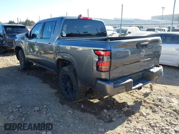 ✅ 2023 Nissan Frontier SV • VIN: 1N6ED1EK4PN607474 • Lot: 41077553. Listed on IAAI with 23,383 mi. Free auction sales archive from the USA and detailed vehicle history report at DreamBid. Image 3.