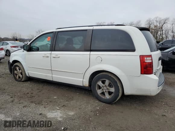 ✅ 2009 Dodge Grand Caravan SE • VIN: 1D8HN44E09B505878 • Lot: 93647525. Listed on Copart with 183,734 mi. Free auction sales archive from the USA and detailed vehicle history report at DreamBid. Image 2.