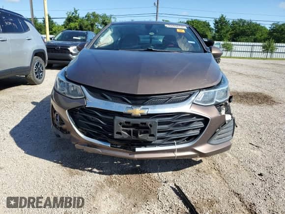 2019 Chevrolet Cruze LS с VIN 3G1BC6SM1KS610867, выставлен на аукционе Copart как лот 61959885 с пробегом Не указан миль и Чистый • Clean title. История ставок и продаж доступна на DreamBid. Изображение 5.