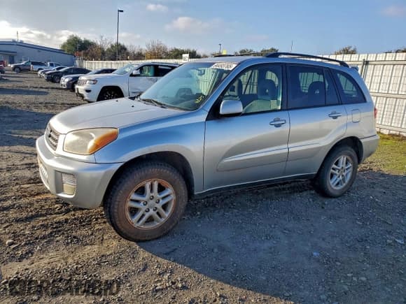 ✅ 2003 Toyota RAV4 • VIN: JTEGH20V830107215 • Лот: 94493765. Опубликован ранее на Copart с пробегом 252 429 миль. Бесплатный доступ к архиву аукционных продаж из США и подробный отчёт об истории автомобиля на DreamBid. Изображение 1.