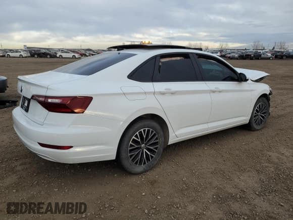 ✅ 2021 Volkswagen Jetta SEL • VIN: 3VWE57BU0MM061395 • Лот: 80946824. Опубликован ранее на Copart с пробегом 100 604 миль. Бесплатный доступ к архиву аукционных продаж из США и подробный отчёт об истории автомобиля на DreamBid. Изображение 3.