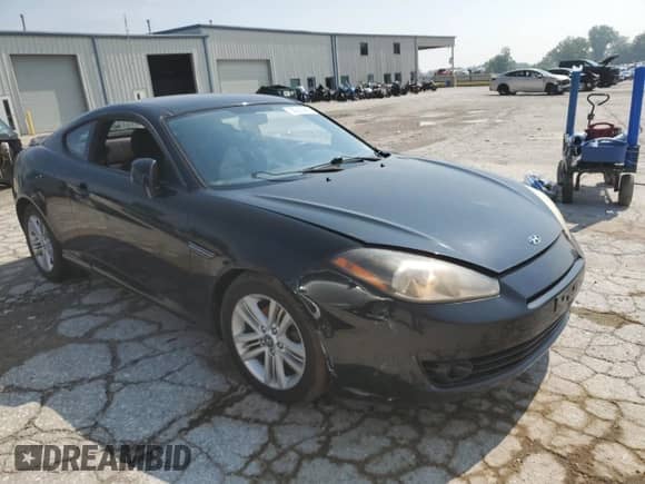 2008 Hyundai Tiburon GS с VIN KMHHM66D88U288354, выставлен на аукционе Copart как лот 59240385 с пробегом 106 687 миль миль и Списание • Salvage title. История ставок и продаж доступна на DreamBid. Изображение 4.