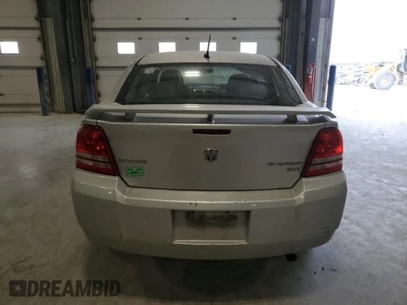 ✅ 2010 Dodge Avenger SXT • VIN: 1B3CC4FB5AN185527 • Лот: 83856564. Опубликован ранее на Copart с пробегом 207 558 миль. Бесплатный доступ к архиву аукционных продаж из США и подробный отчёт об истории автомобиля на DreamBid. Изображение 6.