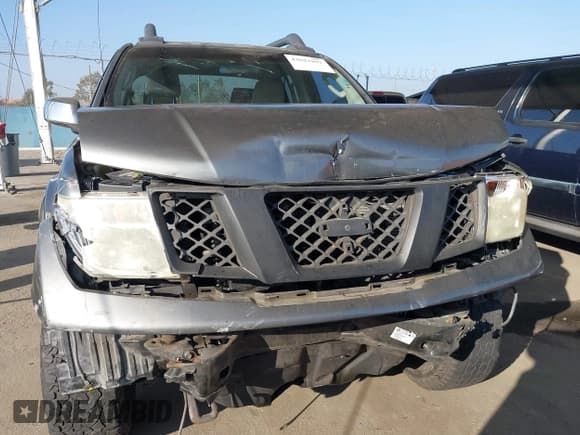 ✅ 2005 Nissan Frontier Nismo • VIN: 1N6AD07W45C460185 • Lot: 43621891. Listed on IAAI with 219,374 mi. Free auction sales archive from the USA and detailed vehicle history report at DreamBid. Image 13.