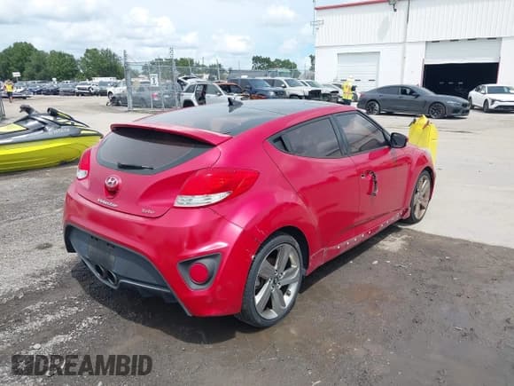 ✅ 2013 Hyundai Veloster Turbo • VIN: KMHTC6AE2DU129756 • Lot: 43147167. Listed on IAAI with 88,763 mi. Free auction sales archive from the USA and detailed vehicle history report at DreamBid. Image 4.